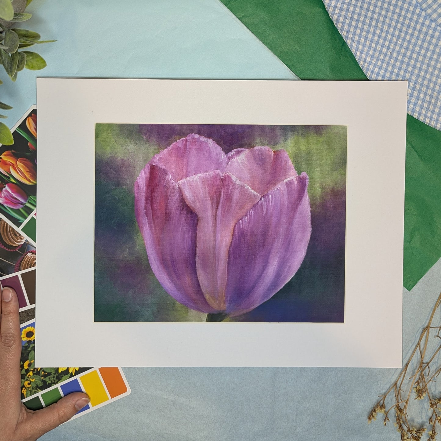 purple tulip on a colorful background